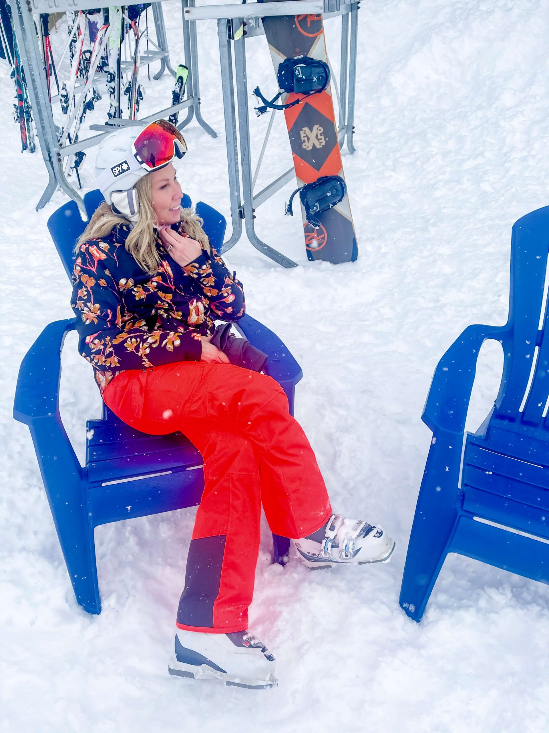 women resting in a chair after skiing
